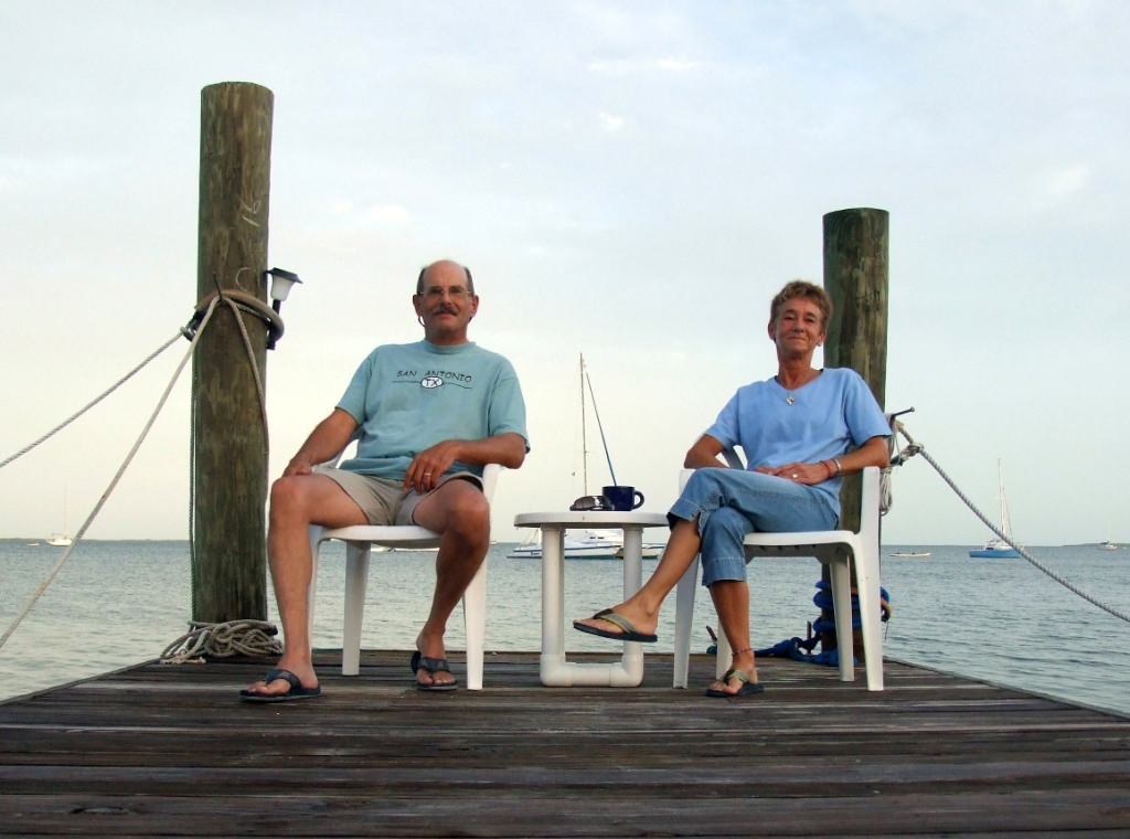 Couple Relaxing on the Docks of Key Largo Cottages - from Connie Lonergan