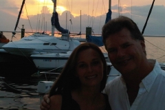 Couple Enjoying the Sunset at the Docks by Mark Currie