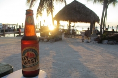 Enjoying a Local Beer in the Florida Keys at Key Lime Sailing Club and Cottages by Karen & Jonathan Hunnisett